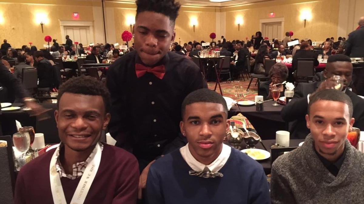 
The James Lewis Essay and Scholarship awards winners: Standing is Von Williams II. Seated from left, are T'’yon Leach, Marvin Sanchez Crumble and Andra Lang Jr.
