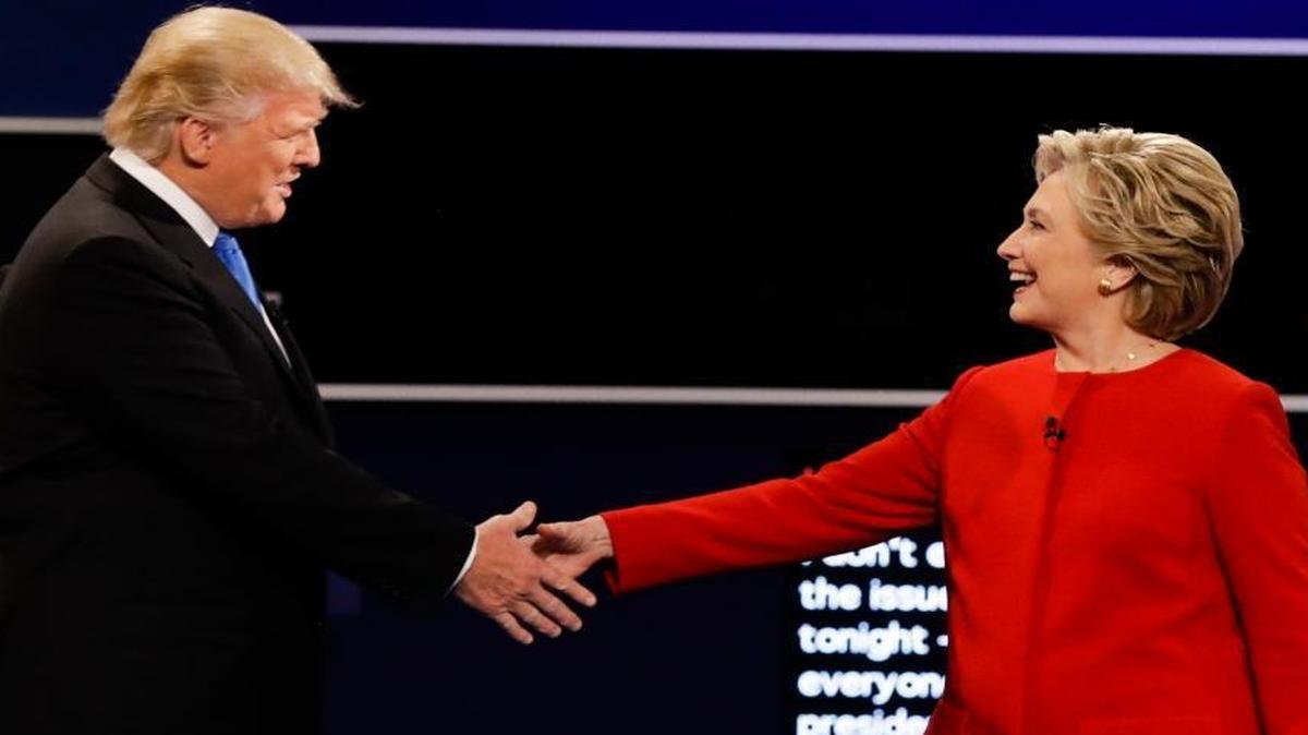 Republican presidential nominee Donald Trump and Democratic presidential nominee Hillary Clinton shake hands during the presidential debate at Hofstra University in Hempstead, N.Y., on Sept. 26.
