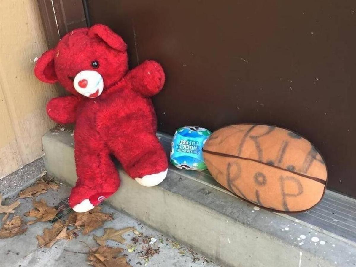 Toys were placed outside the apartment after the toddler’s death.