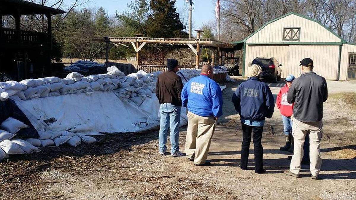 St. Clair County Emergency Management Agency assesses flood damage at a home.