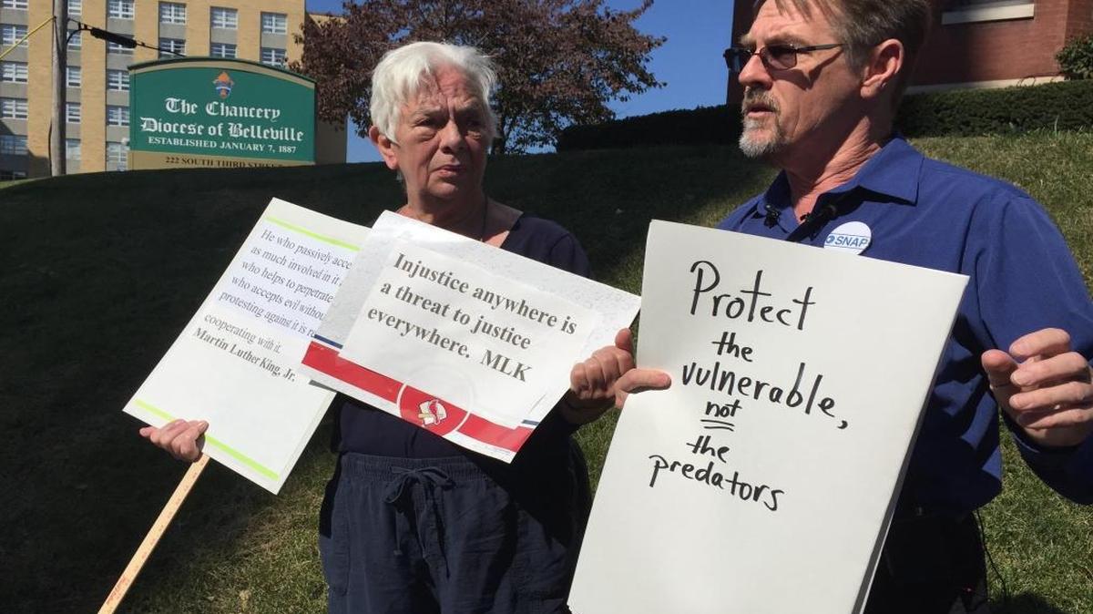 Anne Harter and Dave Clohessy, director of the St. Louis-based Survivors Network of Those Abused by Priests, talk to the media on Tuesday afternoon outside the Chancery office in Belleville.