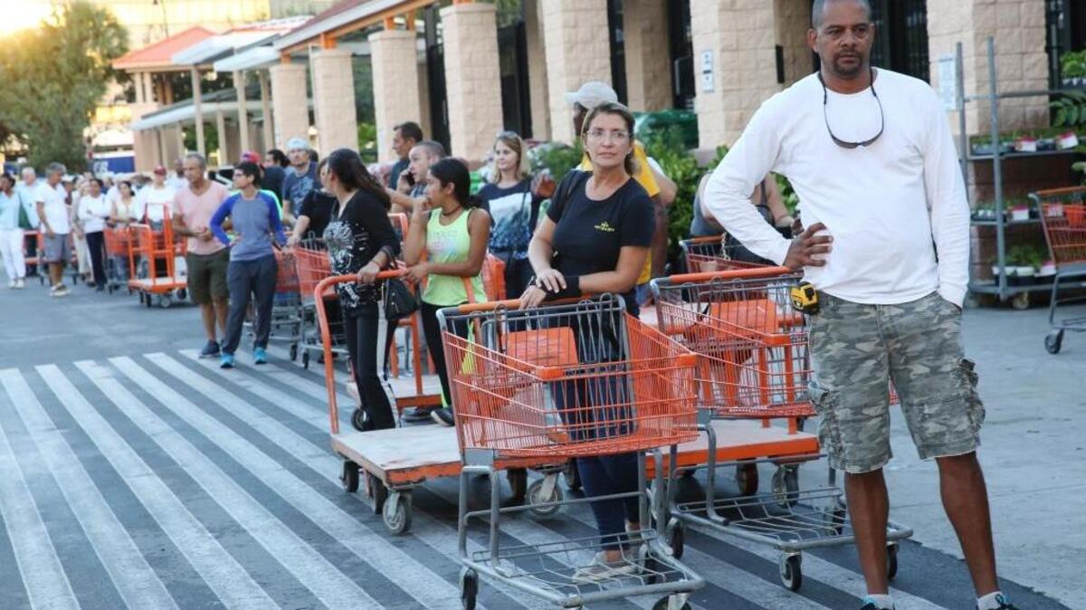 Florida residents lined up to buy plywood prior to Hurricane Irma hitting.