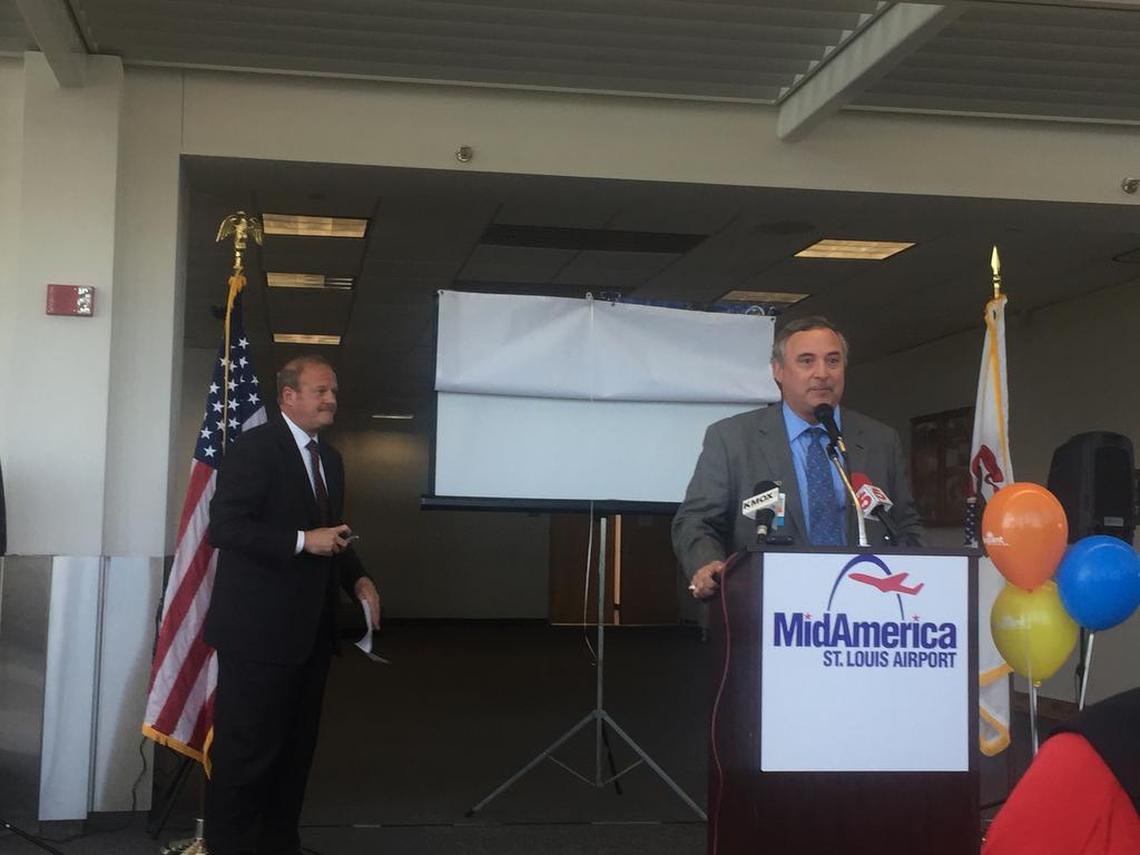 MidAmerica Airport Director Tim Cantwell speaks as St. Clair County Chairman Mark Kern listens shortly before Allegiant Air announced it will offer flights to Las Vegas from the Mascoutah airport.