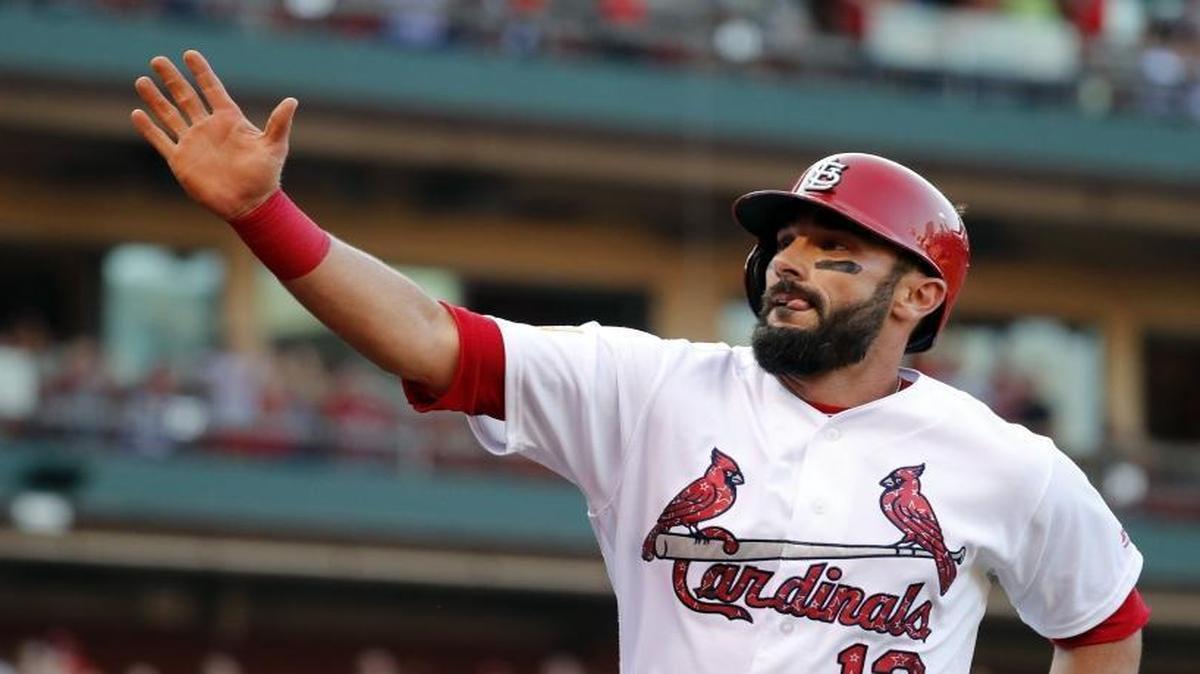 St. Louis Cardinals' Matt Carpenter is congratulated by a teammate after scoring during the first inning of a baseball game against the Miami Marlins Monday, July 3, 2017, in St. Louis. Carpenter tweeted Aug. 28 that he would donate $10,000 to hurricane relief for every home run he got for the rest of the season. (AP Photo/Jeff Roberson)