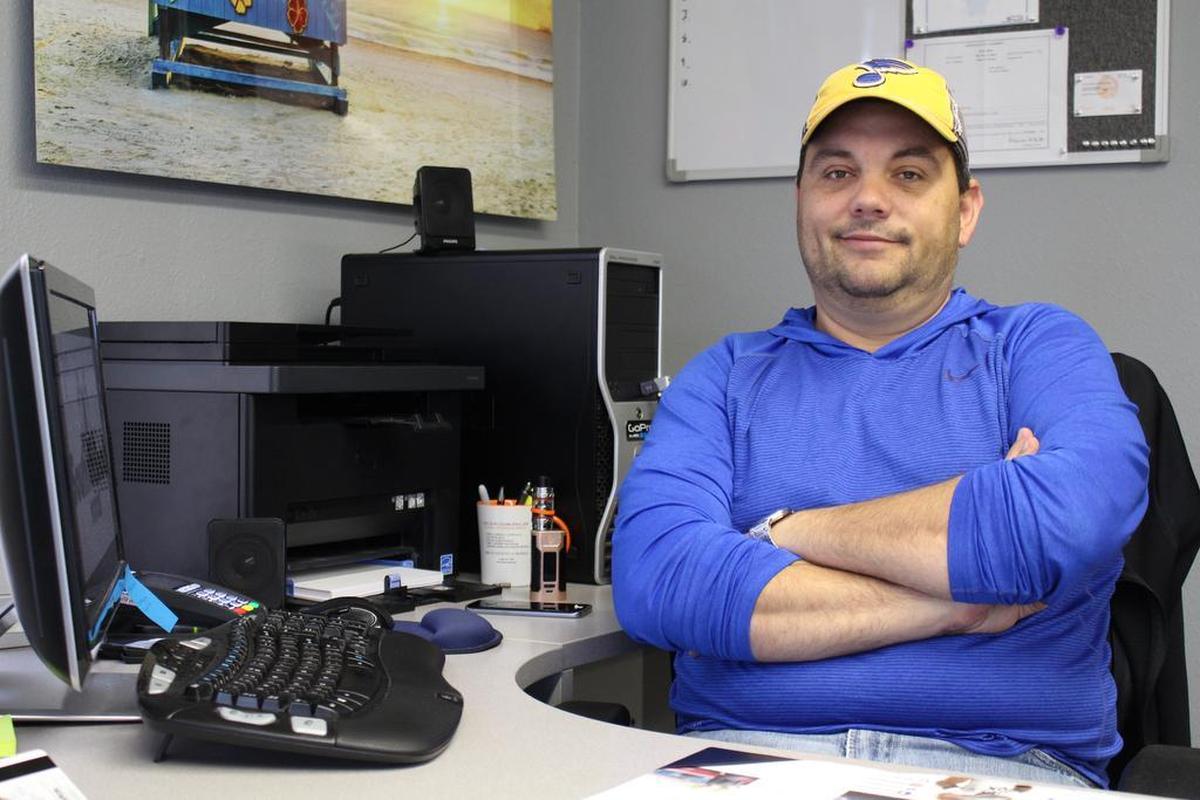 Paul Stamme, general manager at South Beach Motors, has been in the used-car business for 18 years.