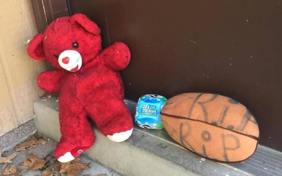 Toys were placed outside the apartment after the toddler’s death.