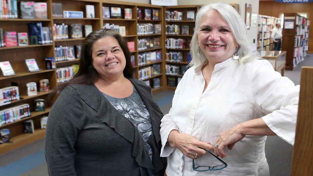 Vicky Hart and Barb Rhodes inside the Collinsville Memorial Library Center.