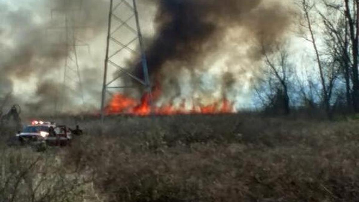 Almost 70 firefighters battled a brush fire Monday afternoon in the 2500 block of Davis Street Ferry Road in Dupo.