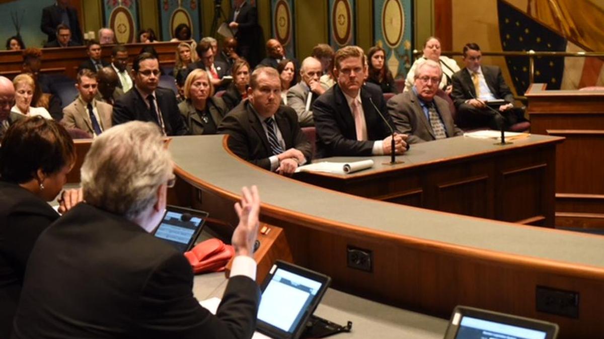 St. Clair County State’s Attorney Brendan Kelly, center, testifies before Senate Committee to abolish statute of limitations in child sex crime cases