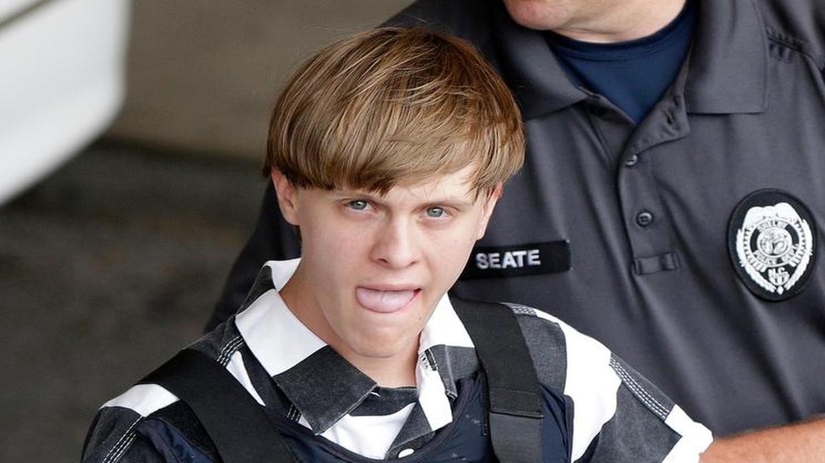 
Charleston, S.C., shooting suspect Dylann Storm Roof is escorted from the Cleveland County Courthouse in Shelby, N.C., Thursday, June 18, 2015. Roof is a suspect in the shooting of several people Wednesday night at the historic The Emanuel African Methodist Episcopal Church in Charleston.
