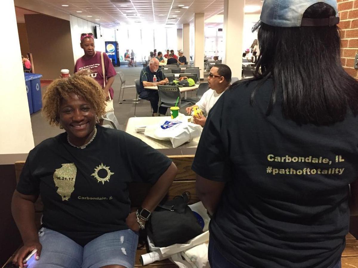 Vanessa Jones, right, and her sister, Tonya Patton traveled from Chicago and Detroit, respectively, to celebrate the eclipse in Carbondale.