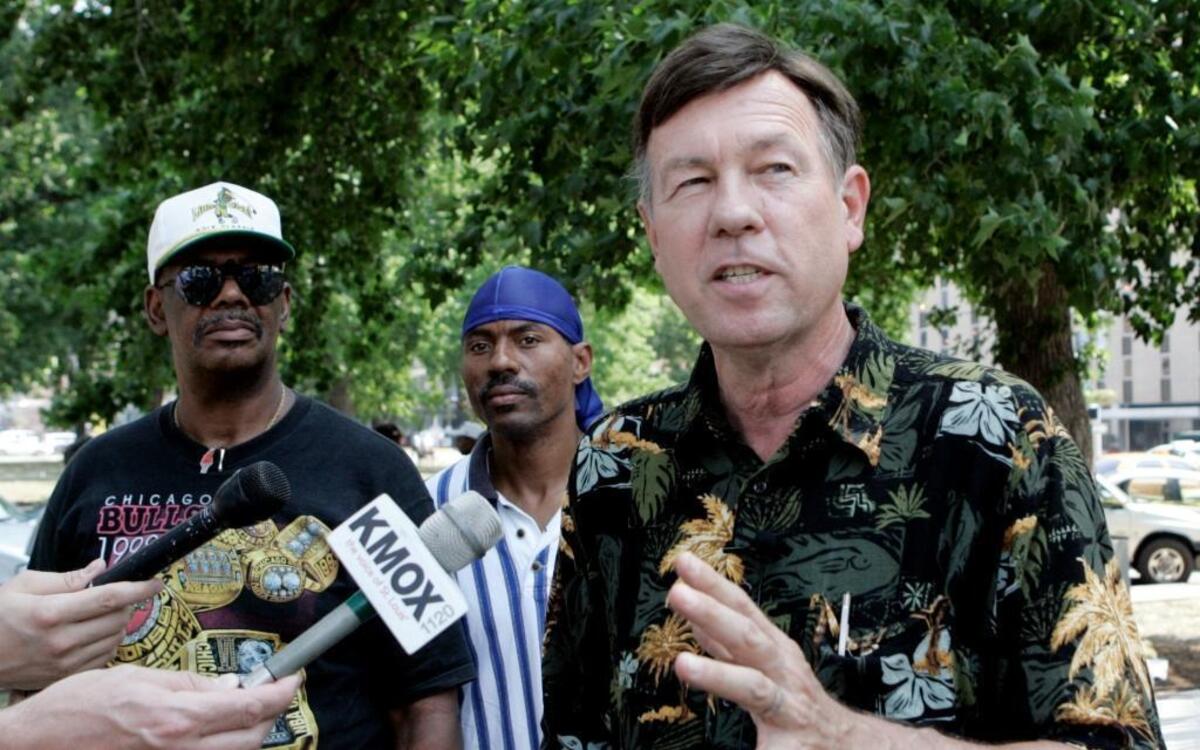 In an AP file photo, the Rev. Larry Rice of the New Life Evangelistic Center gestures during a news conference in St. Louis while discussing the plight of homeless veterans in the city July 3, 2005.