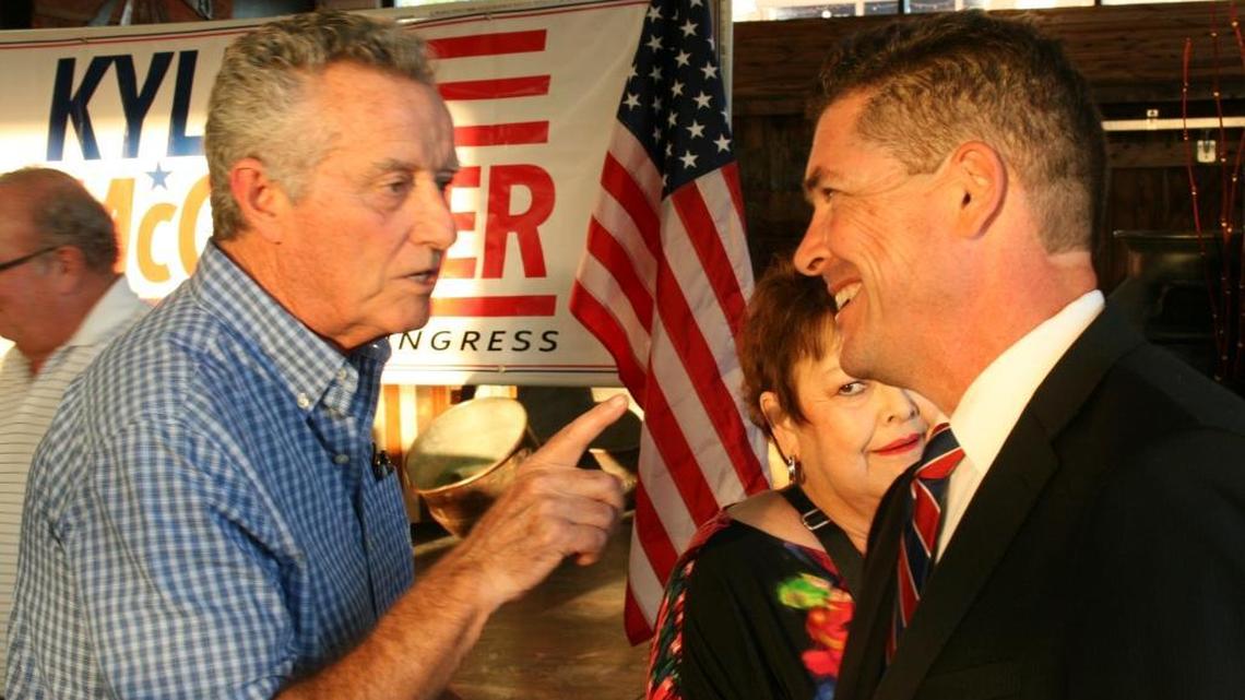 
Keith Hann (left) of Maryville, a supporter of state Sen. Kyle McCarter’s bid for Congress, talks with McCarter in Highland after McCarter officially announced his campaign Wednesday.
