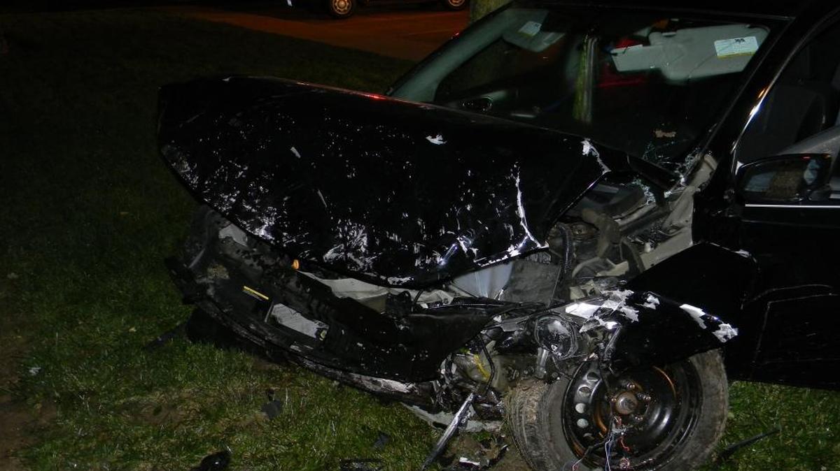 A woman was transported to a St. Louis hospital early Sunday after losing control of her car and crashing into the Northwest Fire Department fire station in Belleville.
