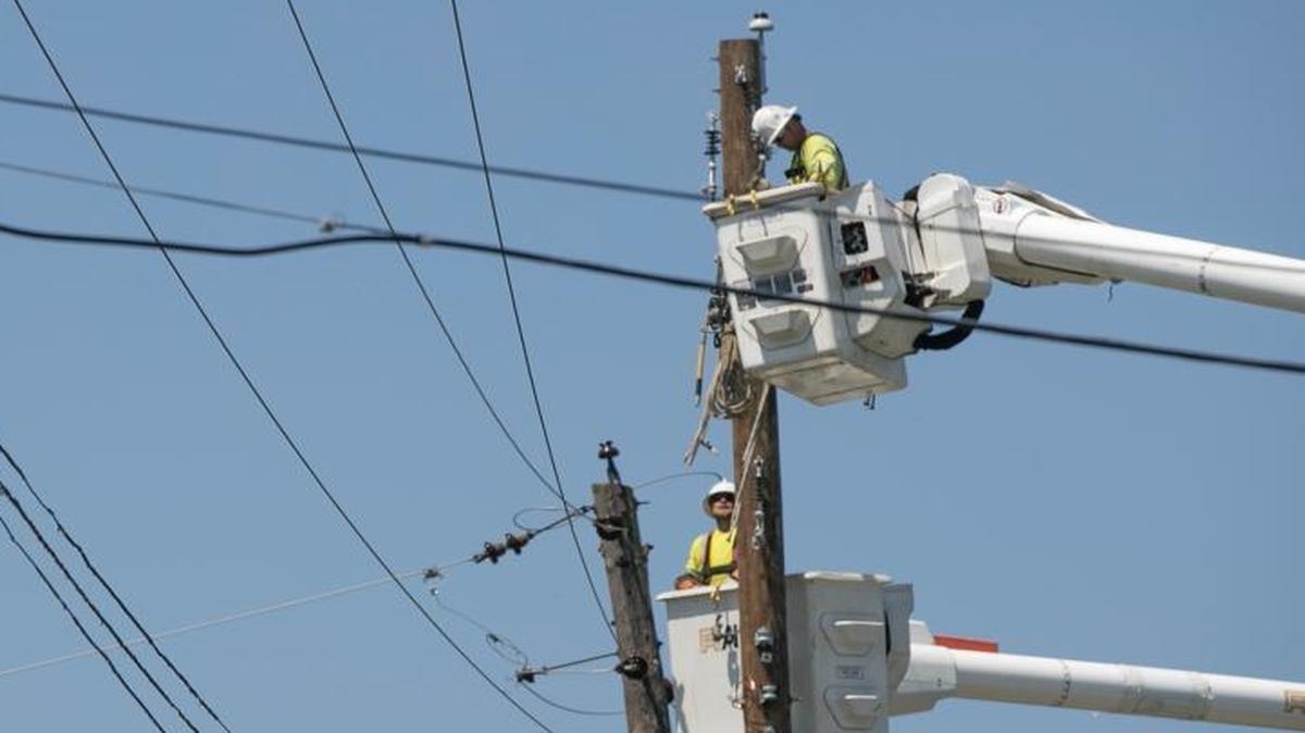 File photo: Contractors with Ameren repair lines in the metro-east.