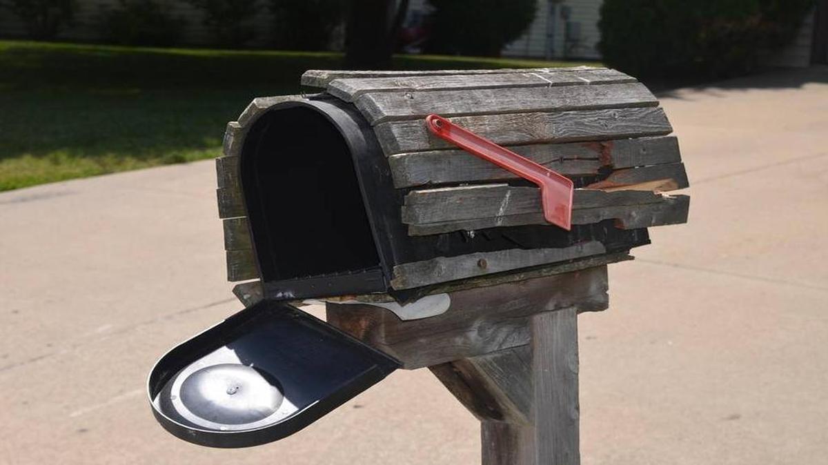A mailbox with decorative wood in the 3200 block of Hunters Way in Shiloh is damaged Sunday, June 19, 2016.
