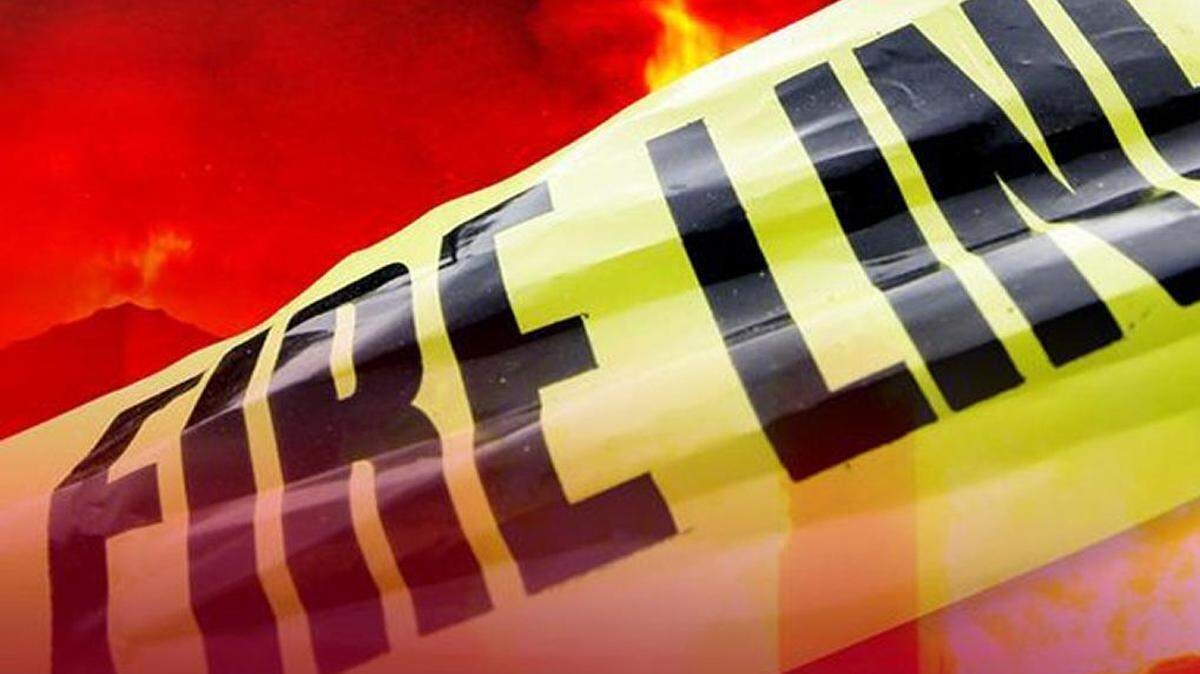 The man was washing his car when it exploded, investigators say, catching his house on fire.