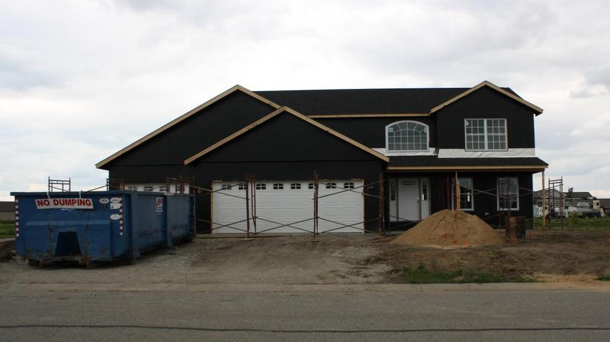 A new home stands under construction in the Indian Prairie subdivision in Mascoutah.