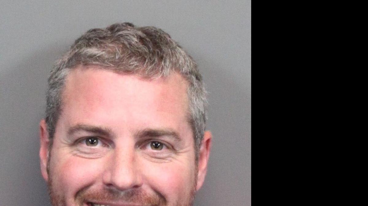 
Booking photo of Air Force Tech Sgt. David L. Helm taken on Monday night, shortly after his arrest outside Reno, Nev., by a Nevada Highway Patrol officer. Helm remains an inmate at the Washoe County Jail, pending his transportation to Scott Air Force Base to face a court-martial on charges related to the sexual abuse of a child and a woman.
