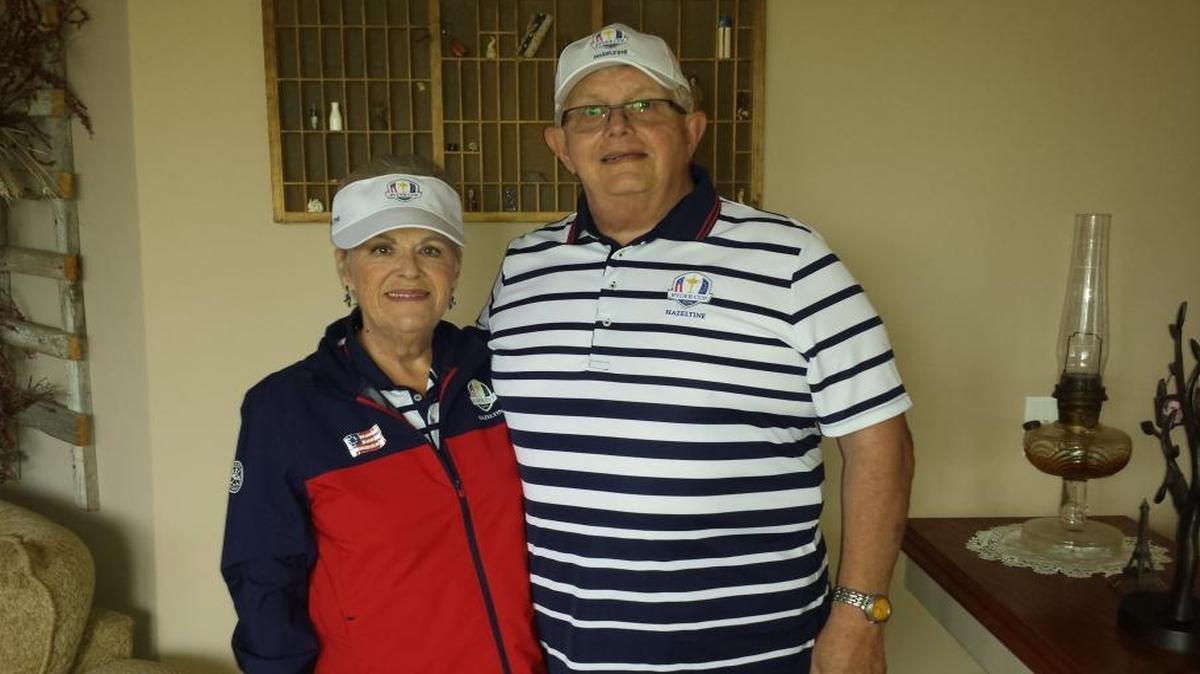 Lynn and Harry Birlew, of Swansea, in their Ryder Cup volunteer uniforms.