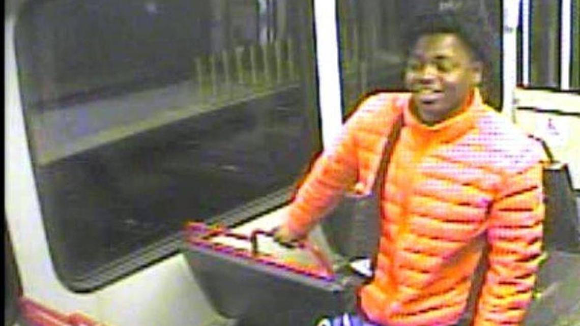 St. Louis police are searching for this person of interest in a MetroLink shooting near Busch Stadium.