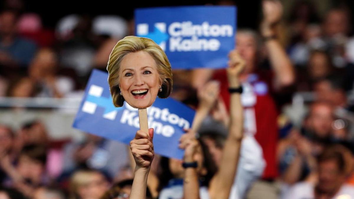 Delegates hold up signs as they show support for Democratic presidential nominee Hillary Clinton during the final day of the Democratic National Convention in Philadelphia on Thursday.