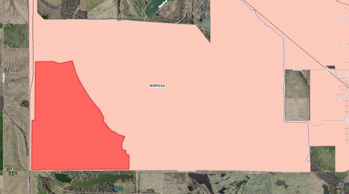 The area highlighted in dark red shows the property north of Risdon School Road in Marissa where a Peabody Energy Company subsidary had planned a luxury multi-use recreational community.