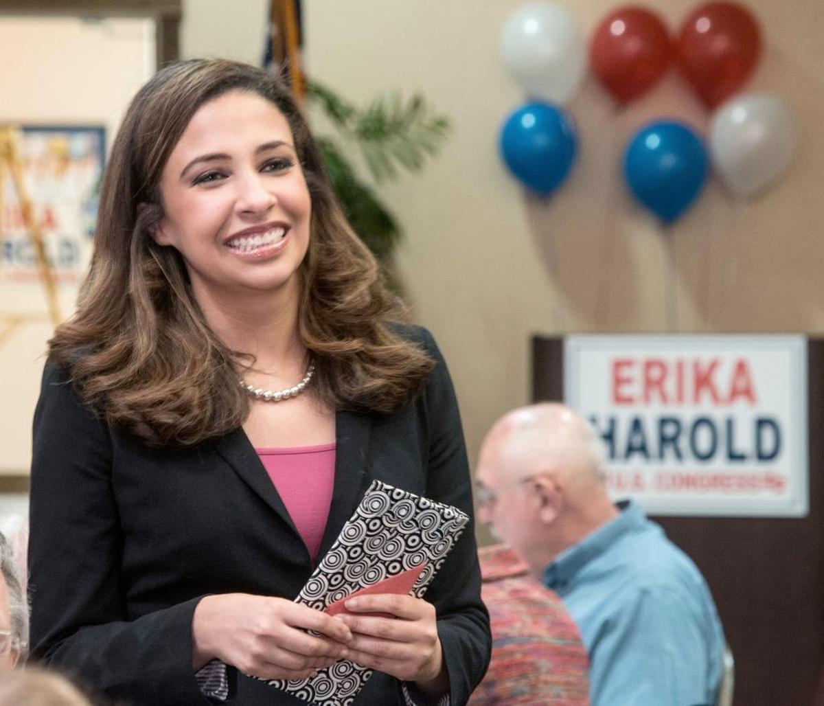 In this March 18, 2014, file photo, Erika Harold, Republican primary candidate for the 13th Congressional District of Illinois, talks to supporters in Champaign, Ill. Harold, a lawyer who is a former Miss America, on Tuesday, Aug. 15, 2017, announced plans for a Republican bid to challenge four-term Democratic Attorney General Lisa Madigan in 2018.