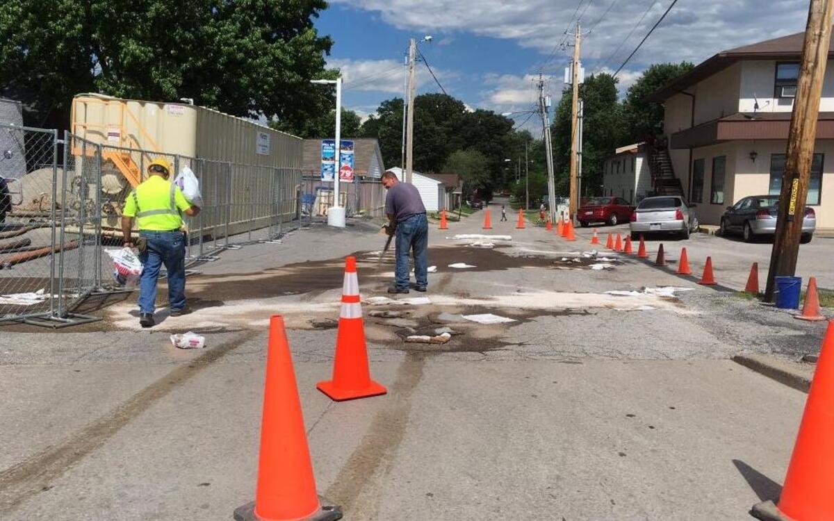 Crews work to clean up a gasoline spill near the intersection of N. 27th Street and West Main Street.