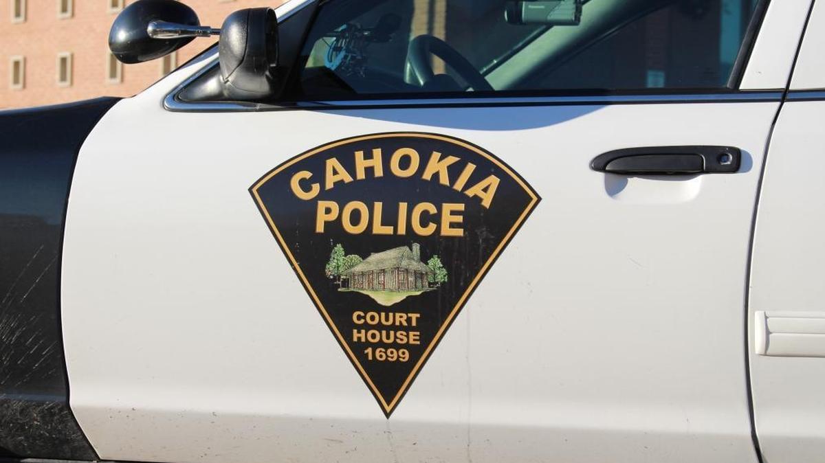 The five officers pulled two disabled people from a burning home, officials say.