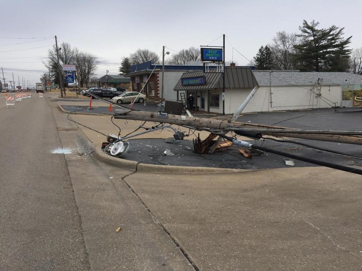 A downed utility pole closed traffic on Lincoln Trail in Fairview Heights temporarily Thursday morning.