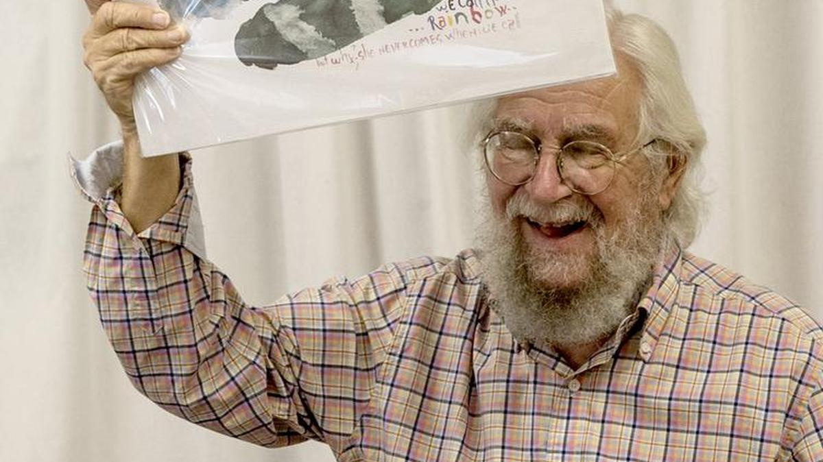 In this file photo from 2018, Don Nedobeck shares his passion for art with residents of Grand Manor in Swansea. Nedobeck died last year but his family will display his artwork at Art on the Square in Belleville this weekend. He specialized in creating whimsical creatures with a heavy emphasis on cats.