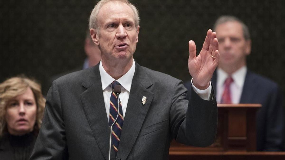 In this Jan. 25, 2017 file photo, Gov. Bruce Rauner speaks in the Illinois House chamber in Springfield, Ill.