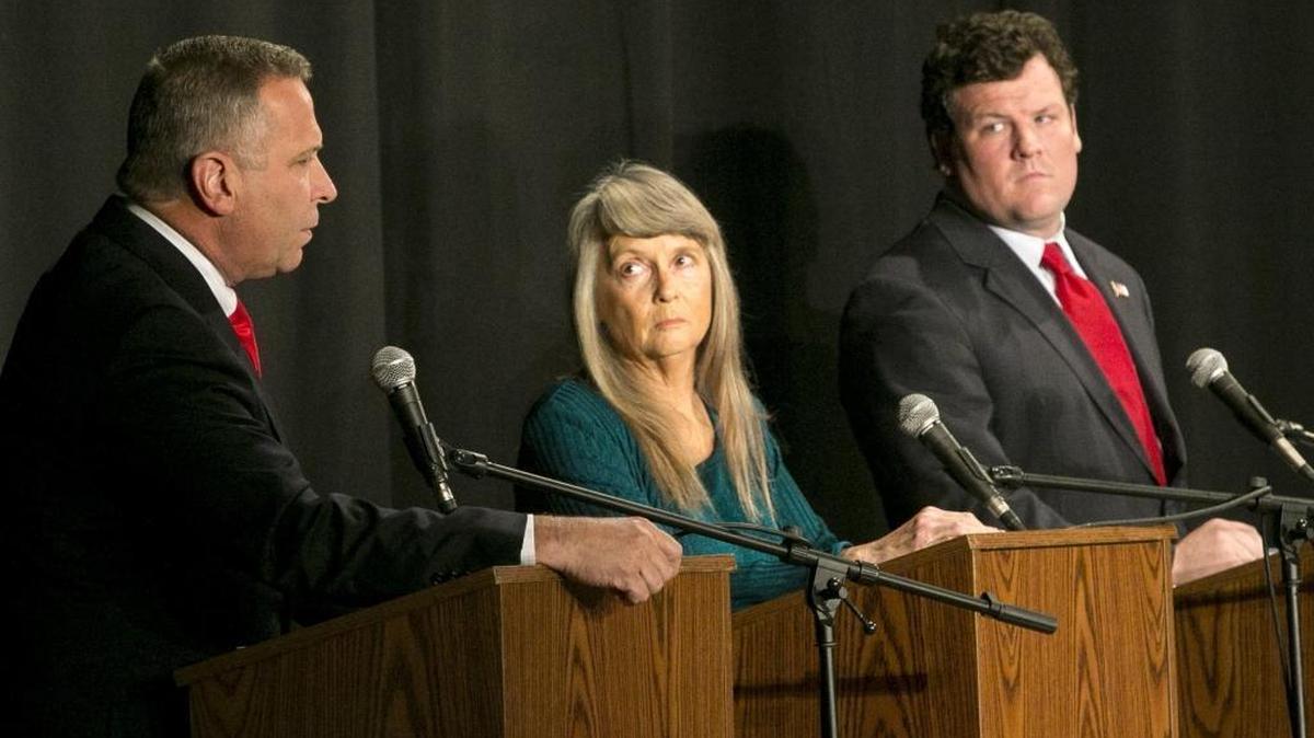 Candidates in Illinois’ 12th Congressional District debated Thursday night in Belleville. From left are incumbent U.S. Rep. Mike Bost, R-Murphysboro; Green Party candidate Paula Bradshaw of Carbondale; and Democratic candidate C.J. Baricevic of Belleville.