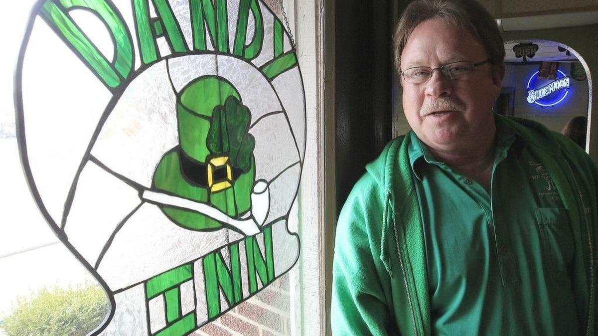 In this 2007 BND file photo, Dandy Inn owner Mark Daniels poses in front a stained glass decoration with the name of the restaurant.