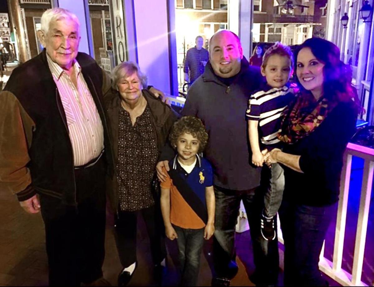 A provided photo of Stan and Pat Kipping (at left) with Jim Ford and his family at the Opera House Bistro in Red Bud.