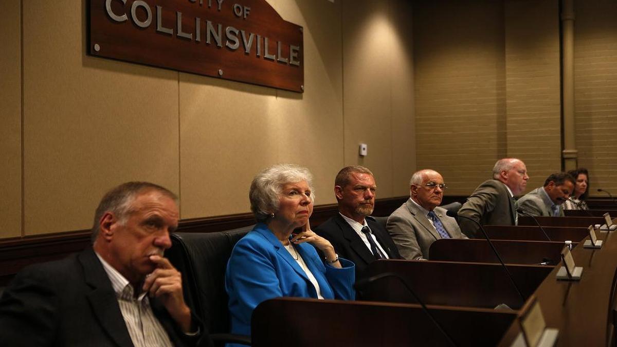 The Collinsville City Council during the July 13, 2015, meeting. From left: Councilman Jeff Stehman, Councilwoman Nancy Moss, Former City Manager Scott Williams, Mayor John Miller, Corporate Counsel Steve Giacoletto, Councilman Jeff Kypta, and Councilwoman Cheryl Brombolich.