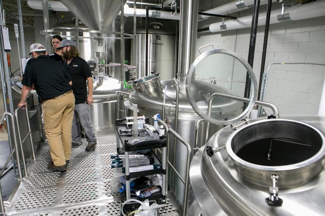 4204 Main Street Brewing Co. has hired three new brewers and is starting to ramp up production at the craft brewery’s banquet center/taproom/production facility at 6435 W. Main St. in Belleville. Head brewer Dustin Luber, brewer Keith Hefley and brewer Bill McFarland work the mash step in the beer making process. The crew is working on scaling up and perfecting their recipes for the new production line.