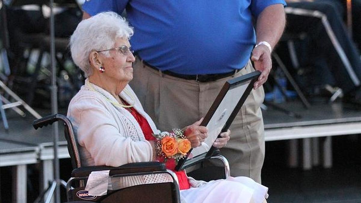 The Annual Mary McHugh Citizens of Character Dinner is named for longtime educator Mary McHugh. In this archival photo, Mary was honored by Belleville Mayor Mark Eckert at the Belleville 200th Anniversary Fourth of July celebration at Southwestern Illinois College. She died in 2014.