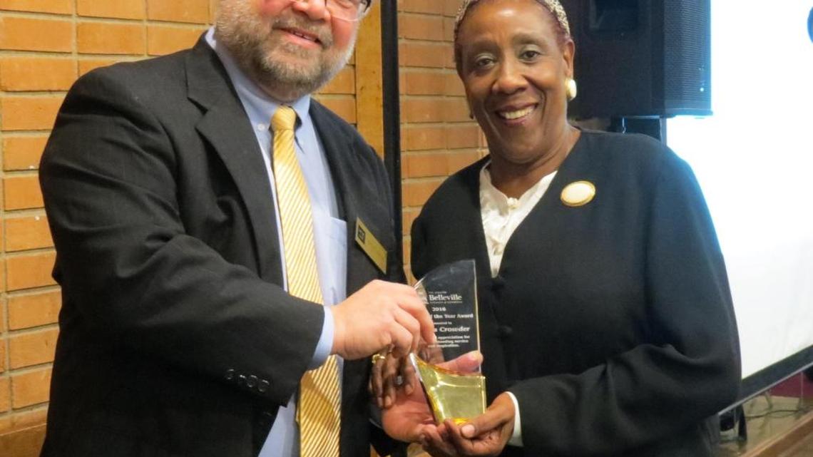 Kevin Richter, left, gives Gloria Crowder the Greater Belleville Chamber of Commerce 2016 Citizen of the Year award Thursday night. Crowder was honored for her work with the 17th Street Neighborhood Association. Richter, an attorney with Mathis, Marifian & Richter Ltd., is the chamber’s president.