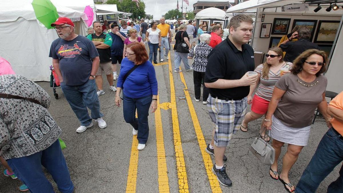 
Belleville's Annual Art on the Square was in full swing on Saturday with large crowds in attendance. This is the "walk of art" on East Main Street. The event continues on Sunday. 
