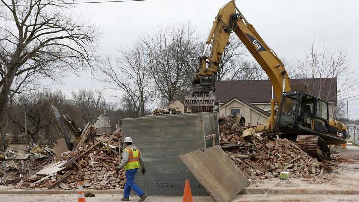 
Workers from Hank's Excavating on March 18 finished up demolition of six properties along North Illinois Street to make way for the Belleville Streetscape project. Hank's received a contract for $109,884 to demolish six buildings, including this one at the corner of North Illinois and West F streets.
