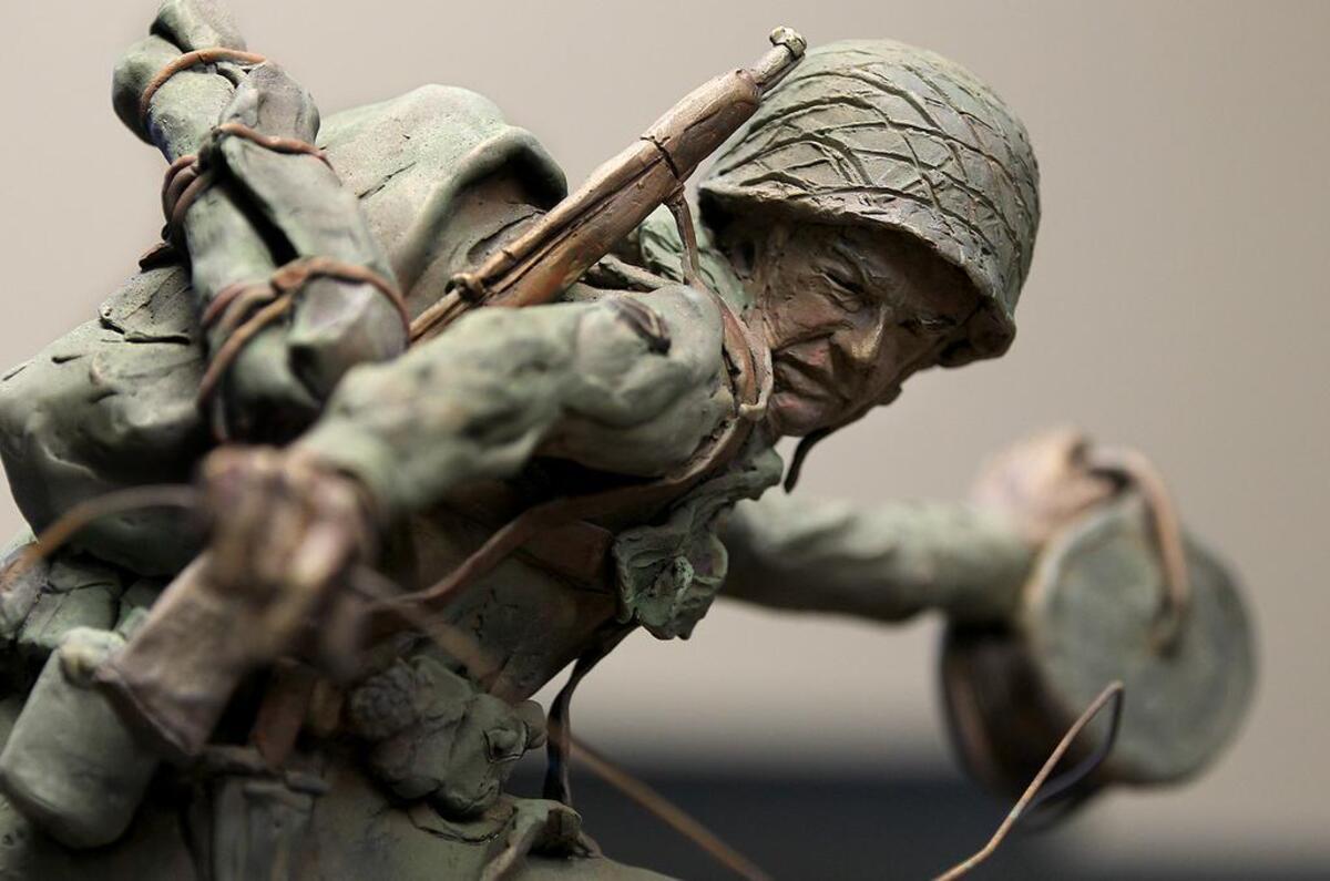 A detail of part of the statue of the late U.S. Army 1st Sgt. Thomas Nicholson. Nicholson lived in Belleville and was highly decorated during World War II. Nicholson’s family had the statue commissioned and is donating it to the city of Belleville.