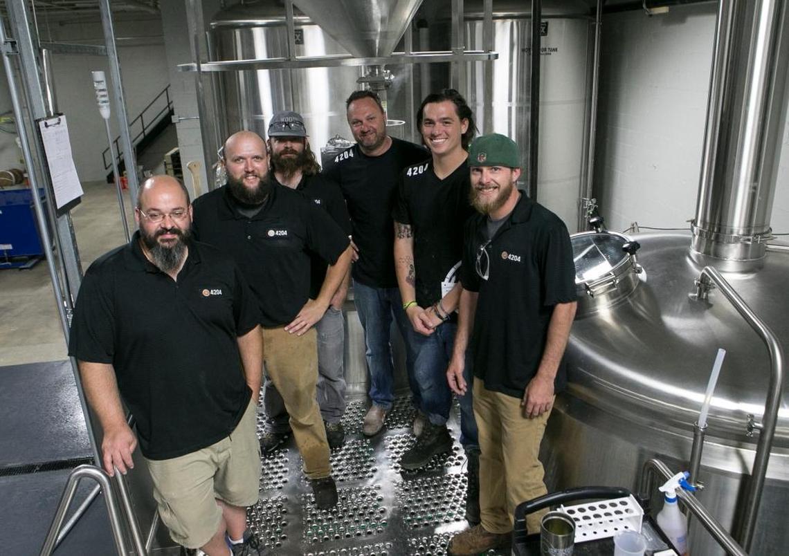 4204 Main Street Brewing Co. has hired new brewers and is starting to ramp up production. Facilities manager Adam Patterson, head brewer Dustin Luber, brewer Keith Hefley, co-owner Todd Kennedy, brewer Bill McFarland and packaging and distribution manager Zach Dahm inside the craft brewery’s banquet center/taproom/production facility at 6435 W. Main St. in Belleville.