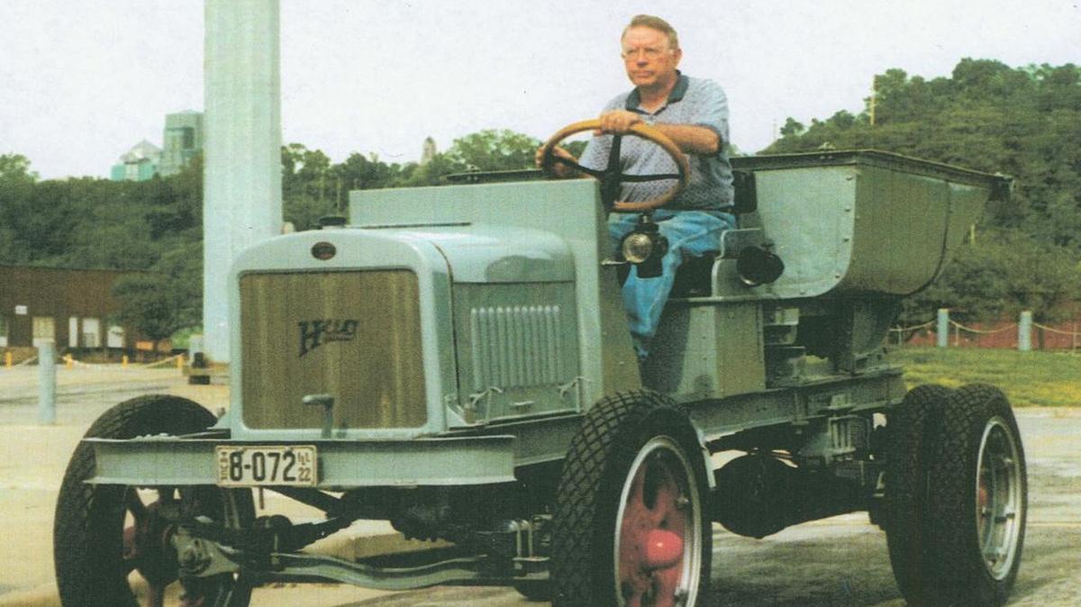 Chuck Rhodes drives his Hug Truck No. 42, which he restored, in the Highland Sesquicentennial parade in 1987.