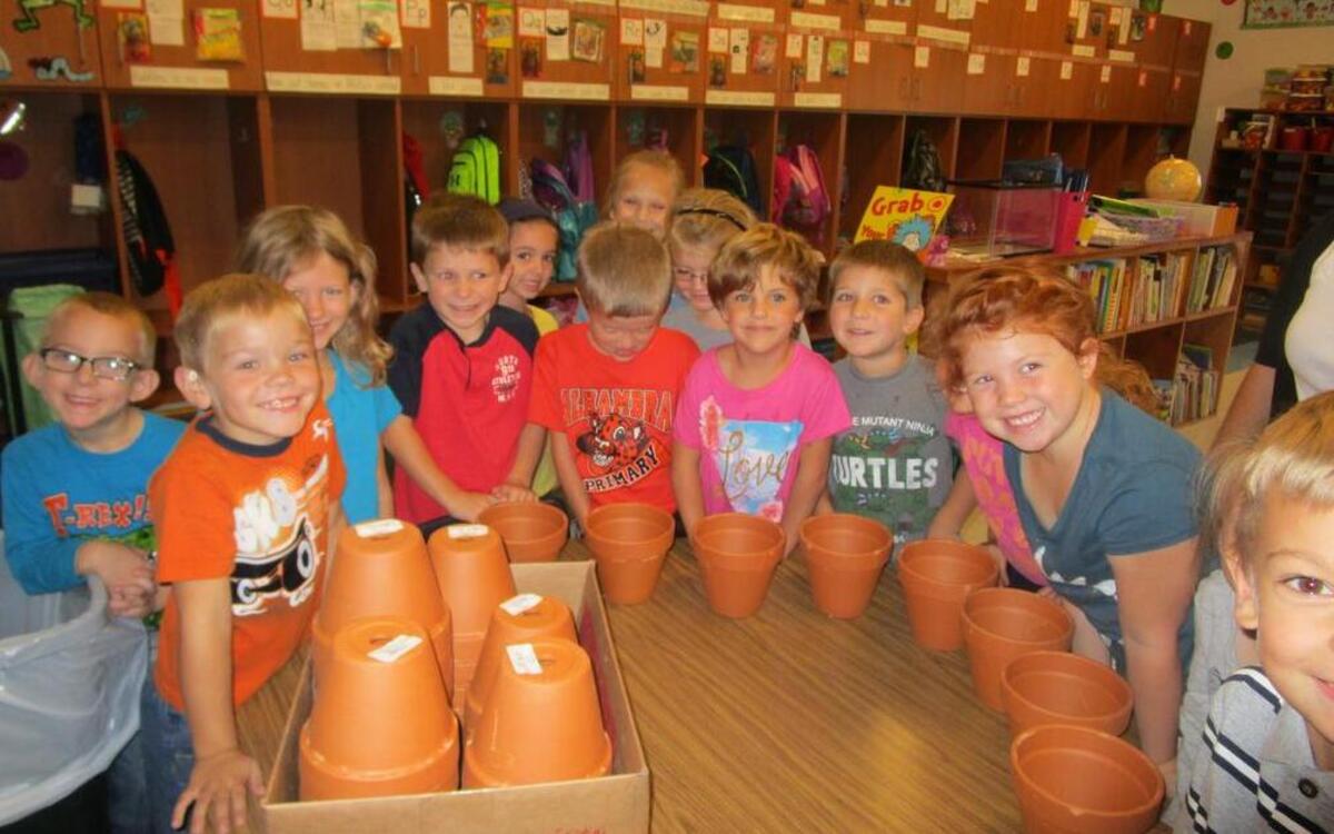 Students at Alhambra Primary show off their “Special Project” items that they received from the Alhambra Community Club. Each year the Community Club, in lieu of flowers for Teachers Appreciation Week, asks for a list from each of the teachers for items they may need in their classroom. Kleenex, wipes and markers are some of the items on their lists. Sometimes for a special project, a teacher may need something a little different.