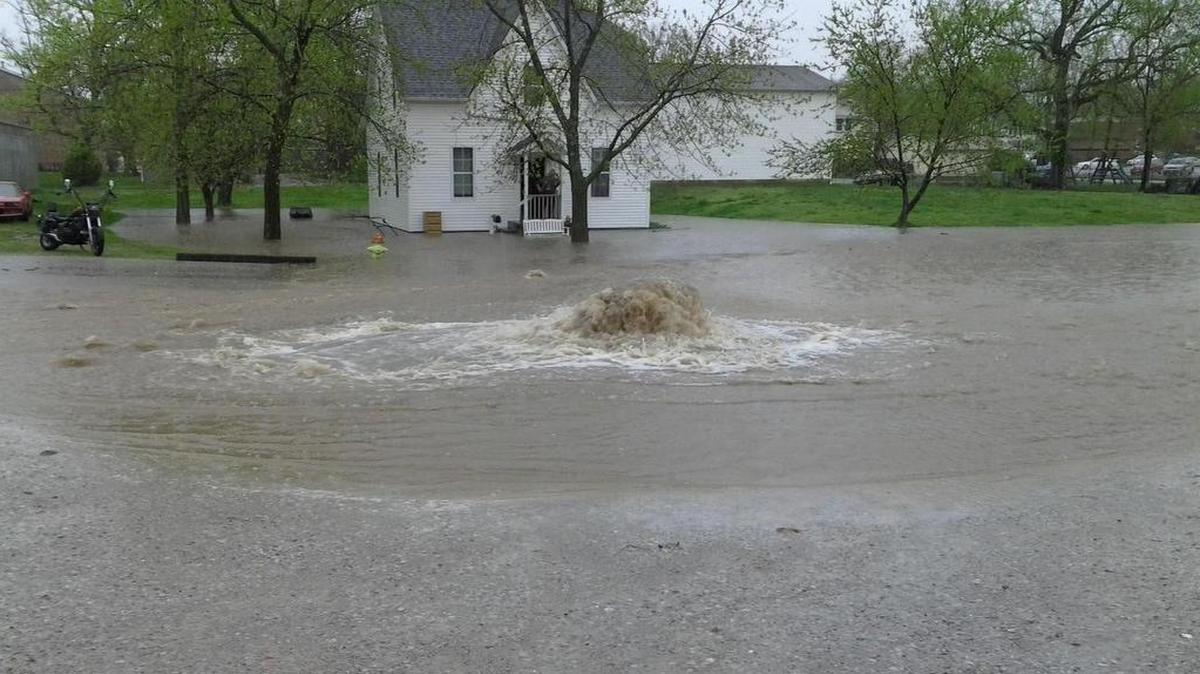 
Mike Gilomen believes a manhole, located in a parking lot across the street from his property at 511 12th Street, is the root of the on flash flooding problem. During the Aug. 4-5 rain, that manhole cover blew off, sending water several feet in the air, he says.
