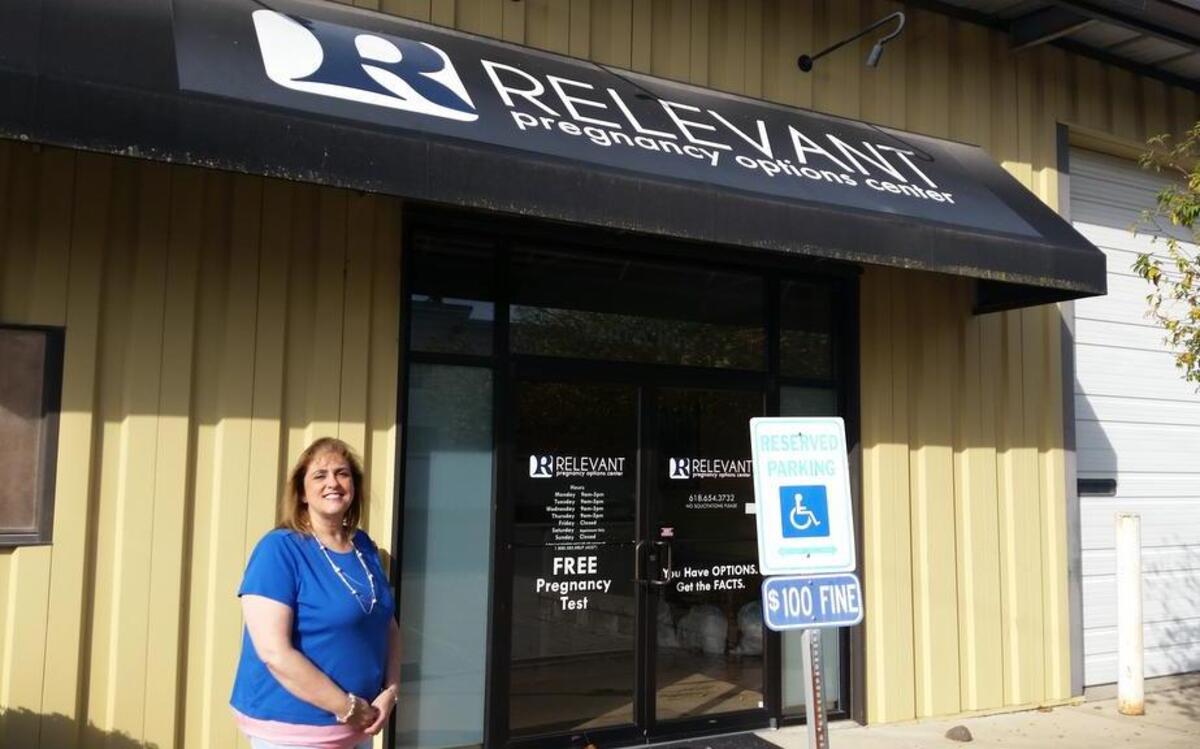 Relevant Pregnancy Option Center Executive Director Tricia Blasdel stands outside their current facility located at 410 A Pine Street in Highland. The center is trying to raise $350,000 by the end of the year in order to purchase a new facility for their growing clientele list.