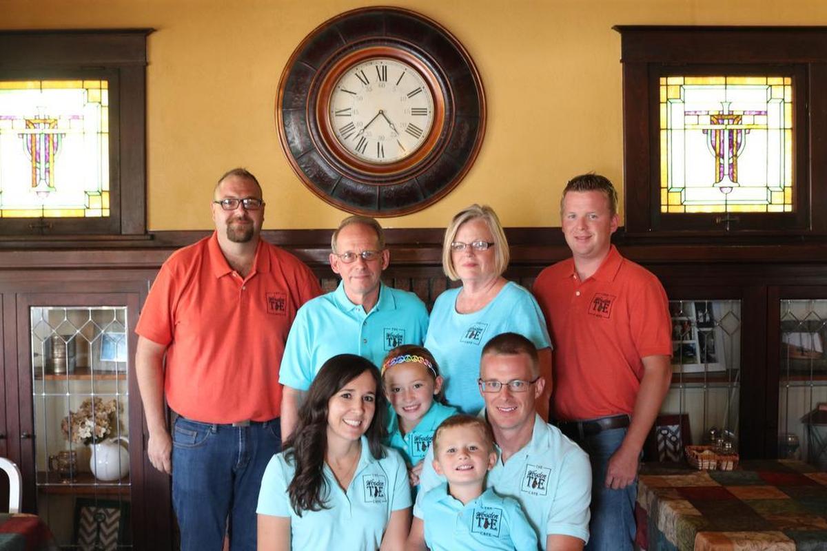 The staff of the Wooden Tie Cafe, located at 206 Illinois 143 in Pierron. Front row, from left to right is Mary Jackson, Emma Jackson, Tommy Jackson and Joe Jackson. Back row from left to right is Stephen Siemaszkiewicz, Bob Jackson, Sharon Jackson and Andy Jackson. For the past seven months, the Jackson family has been working to renovate the old Mewes house into the cafe. The cafe offers smokehouse styled simple foods with locally farmed meat, produce and dairy.
