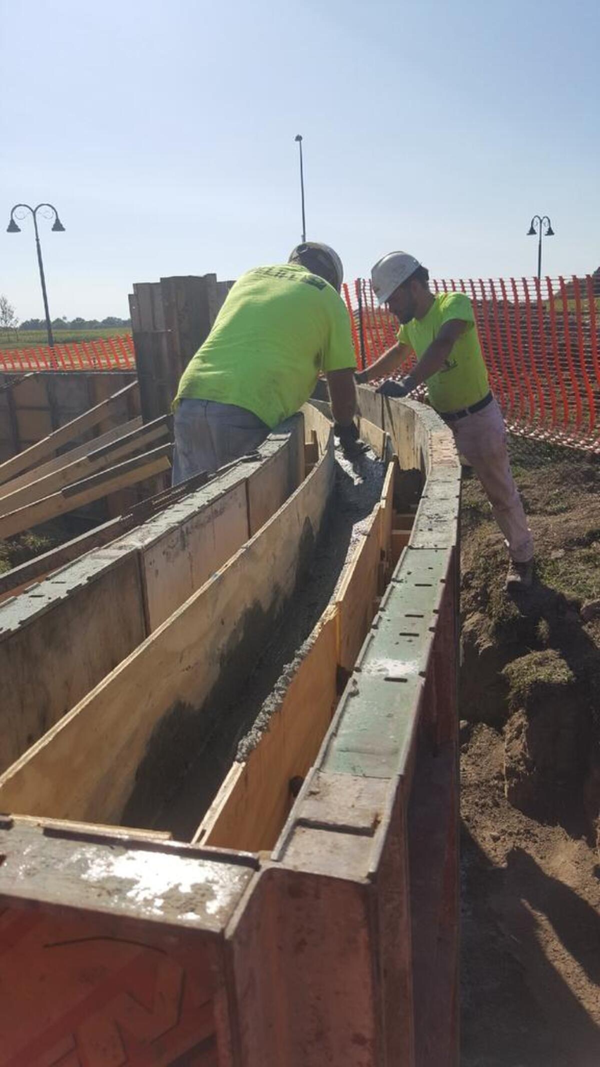 Construction of the Wall of Remembrance and Honor at Dennis H. Rinderer Park in Highland.